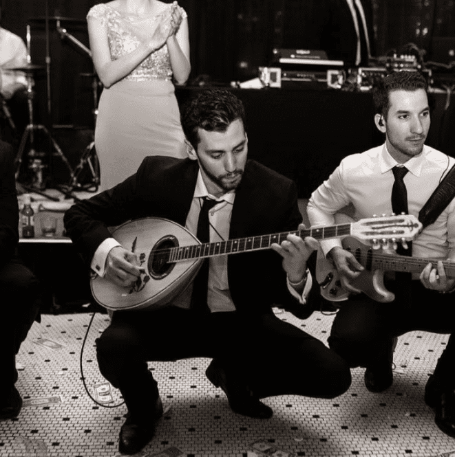 A traditional live bouzouki band at a greek wedding.