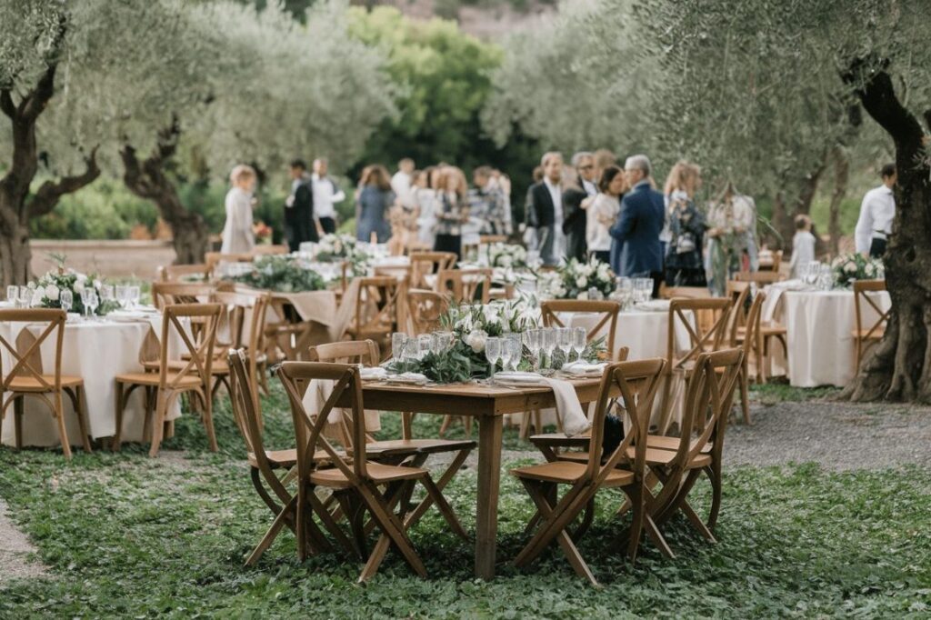 Guests enjoying a Greek destination wedding reception outdoors.
