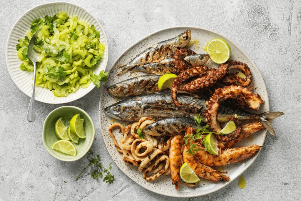 an array of freshly grilled Greek seafood with fish, octopus, and squid