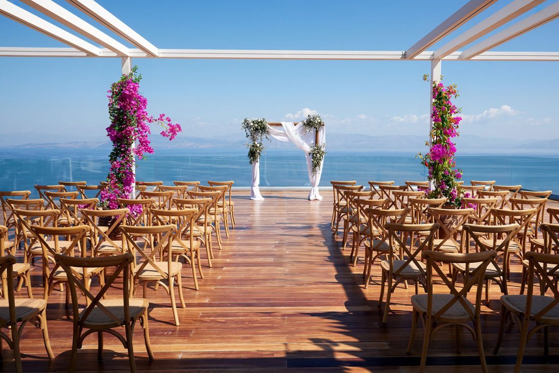 Angsana corfu resort and spa a wedding trellace setup with an aegean sea view in the background