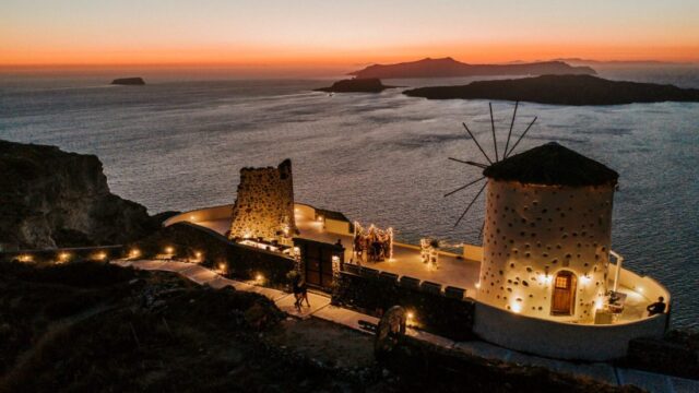 el viento windmills overlooking santorini perfect elopement destination venue