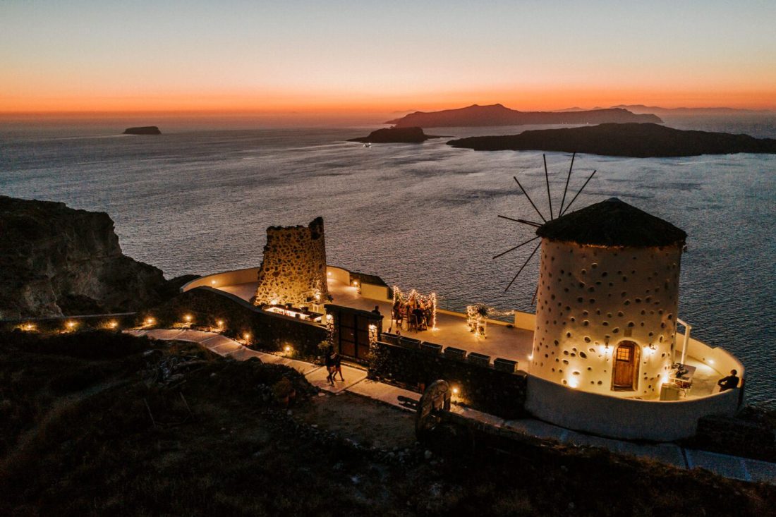 el viento windmills overlooking santorini perfect elopement destination venue