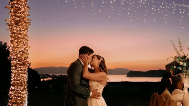 sea view by enkipo wedding venue in crete newlywed couple at dusk kissing