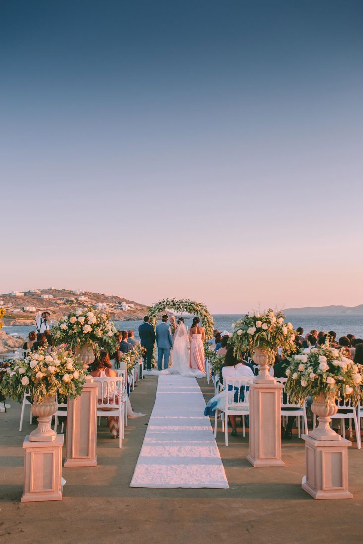 Mykonos wedding villas saint john wedding ceremony in front of the aegean sea