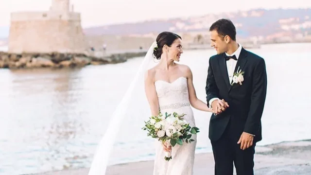 a newlywed couple eloping in greece at chania old harbor