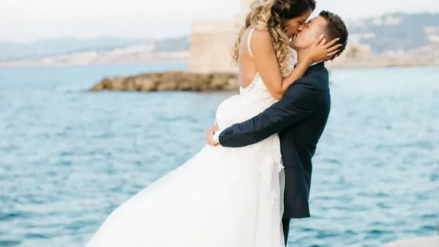 a newlywed couple eloping in greece at chania old harbor