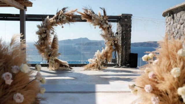 beautiful flower wedding arch in santorini