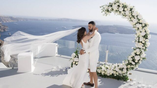 bride and groom embracing at a santorini wedding