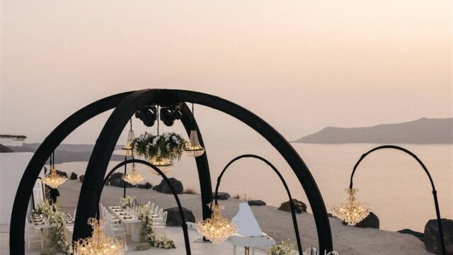 chandeliers over a wedding table in santorini