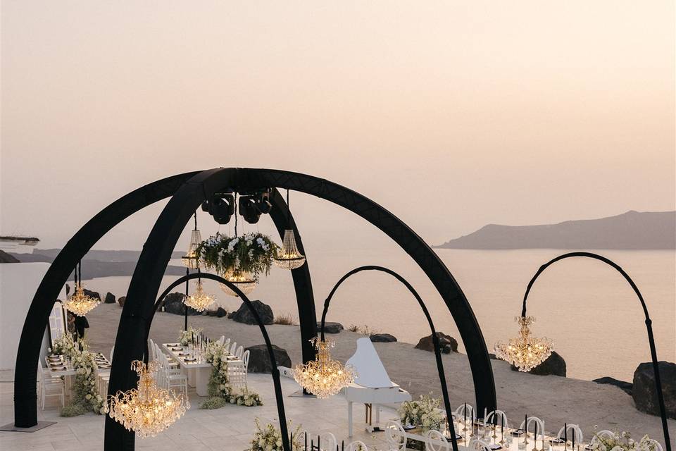chandeliers over a wedding table in santorini