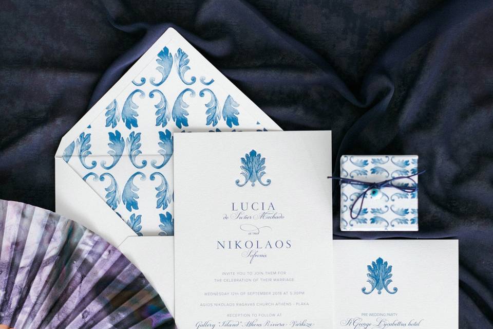 a set of wedding invitations for a wedding in greece