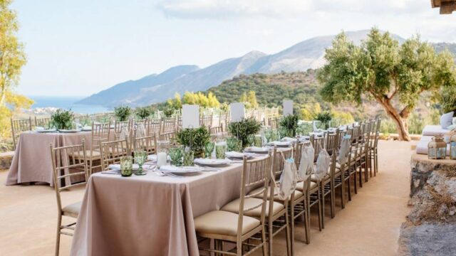 greece wedding tables with sea and mountains