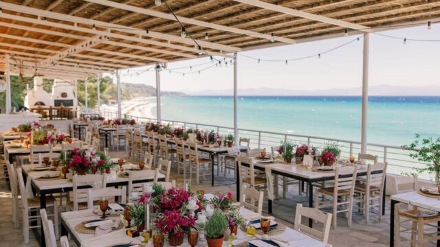 greece wedding tables in front of the sea
