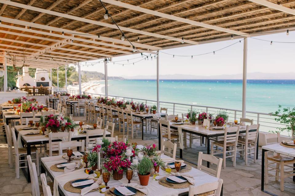 greece wedding tables in front of the sea