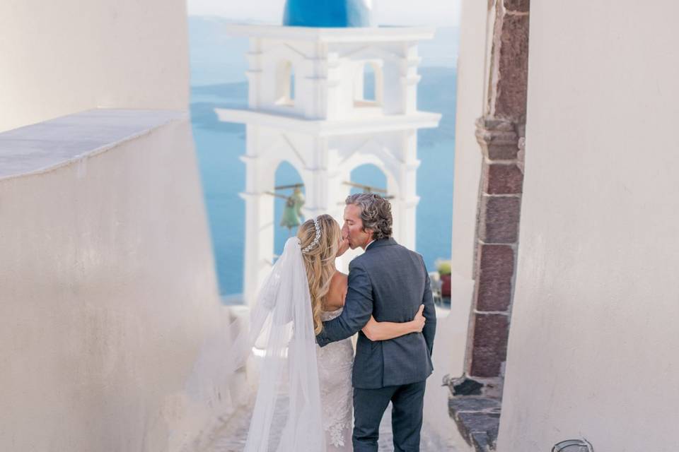 a wedding couple embracing at a wedding in greece