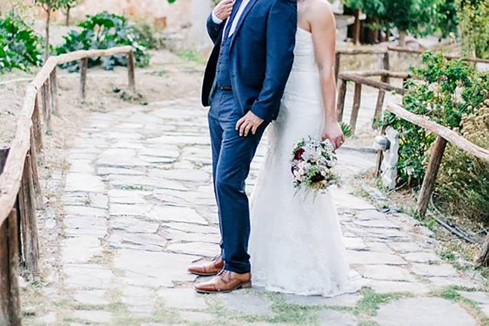 a wedding couple posing in greece