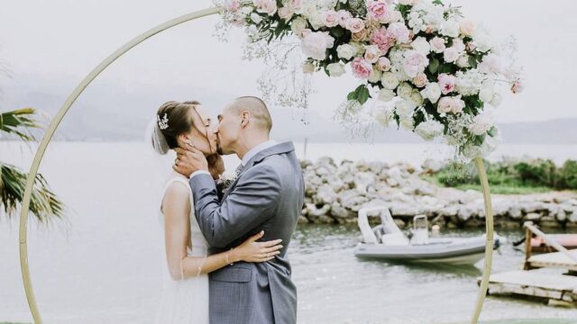 wedding couple kissing at a wedding in greece