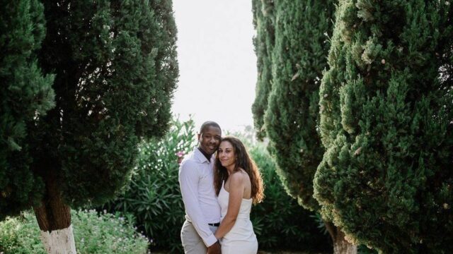 couple posing at a greek wedding