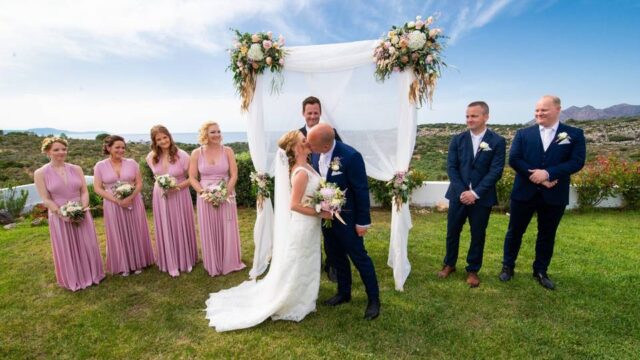 a couple getting married in greece