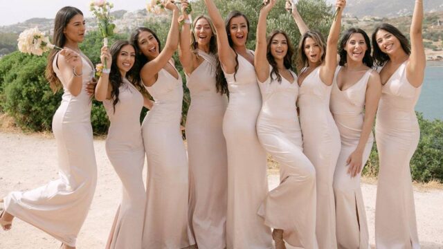 bride and her bridesmaids at a greek wedding
