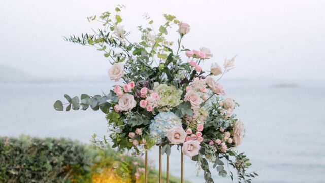 a large bouquet of flowers for a wedding in santorini
