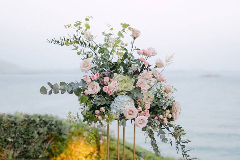 a large bouquet of flowers for a wedding in santorini