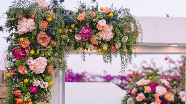 beautifully colored flowers at a greek wedding