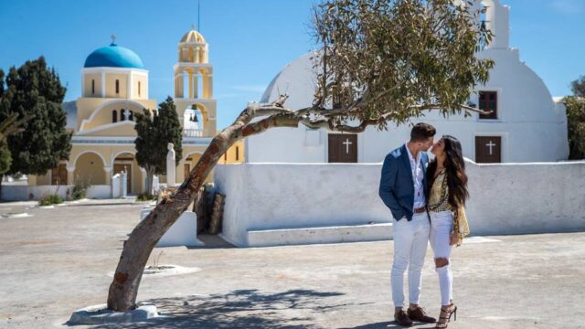 a newly engaged couple in santorini