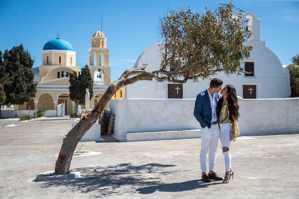 a newly engaged couple in santorini