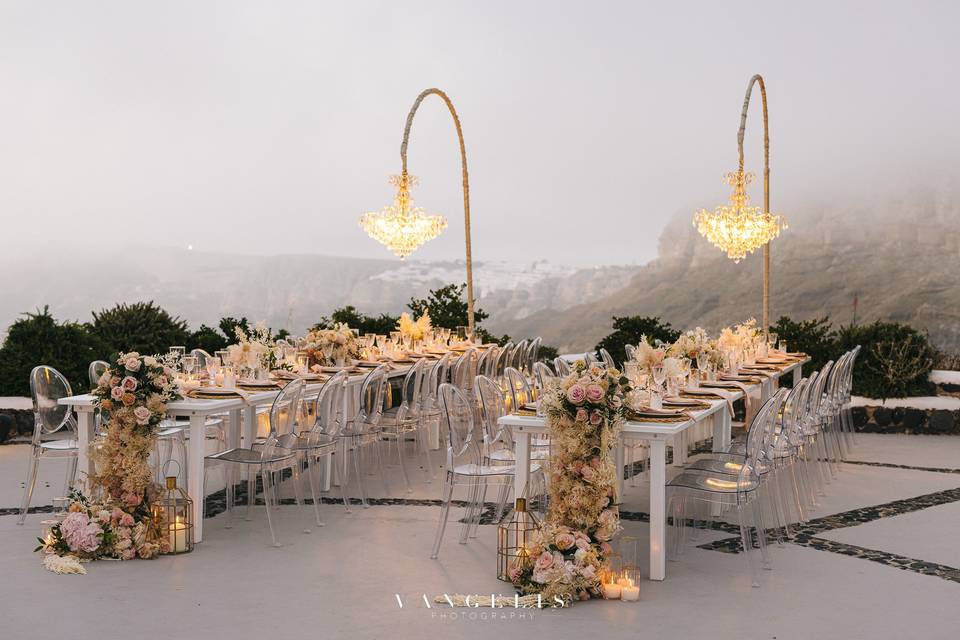 beautifully set wedding tables at a santorini wedding