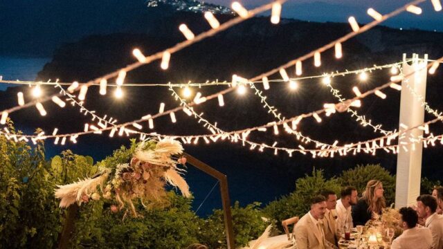 string lights at a wedding in greece