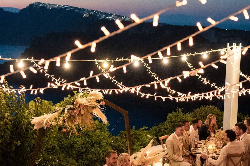string lights at a wedding in greece