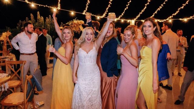 reception party goers at a greek wedding