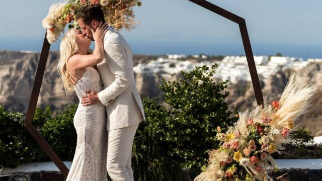 a newly-wed couple embracing