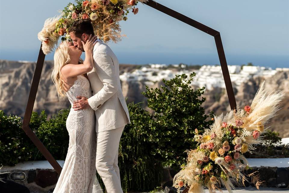 a newly-wed couple embracing