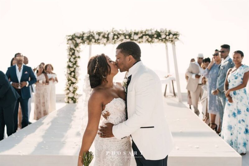 a couple embracing at their wedding in santorini