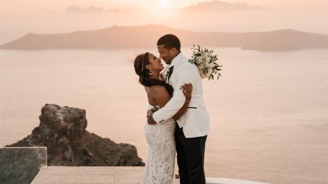 a couple embracing at in front of the aegean sea