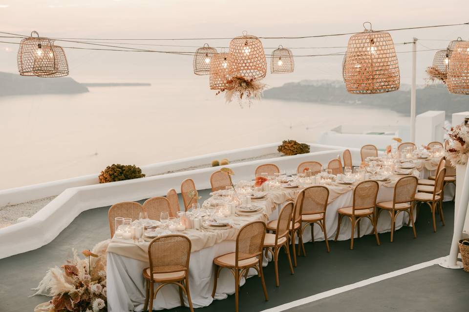 beautifully set tables for a wedding in santorinin