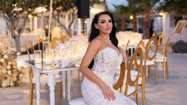 a bride posing at her destination wedding greece