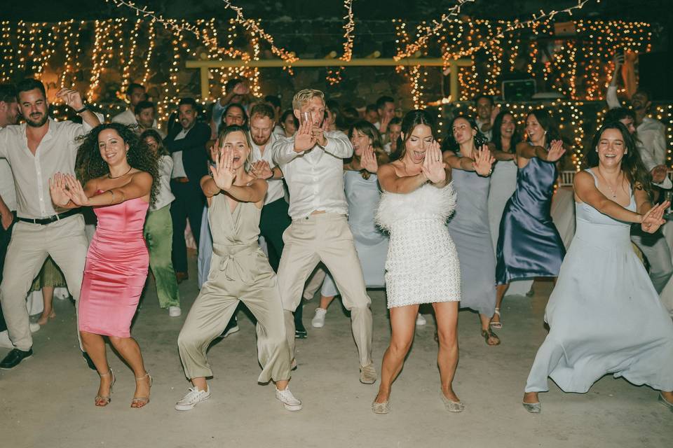a party at a greek destination wedding