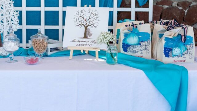 a wedding table decorated for a wedding in greece