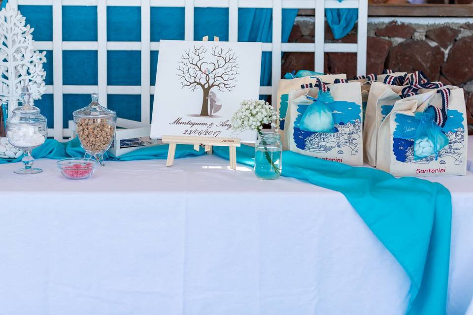 a wedding table decorated for a wedding in greece