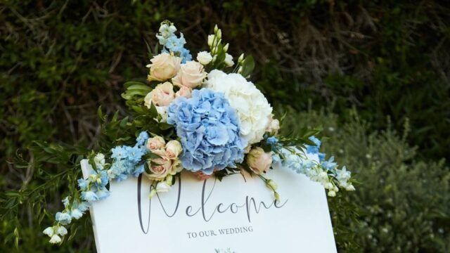 a greek wedding welcome sign