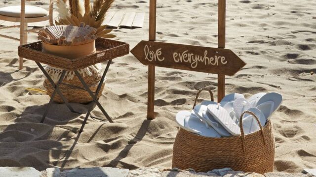 a basket and setup for a beach wedding in greece