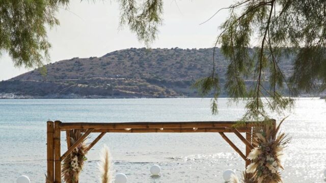 a wedding arch with flowers in greece