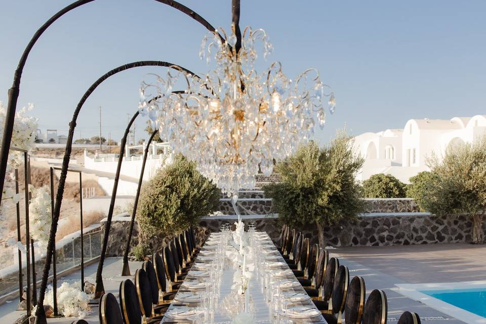 a large chandelier at a wedding in greece