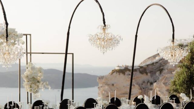 chandelier hanging over wedding table in santorini