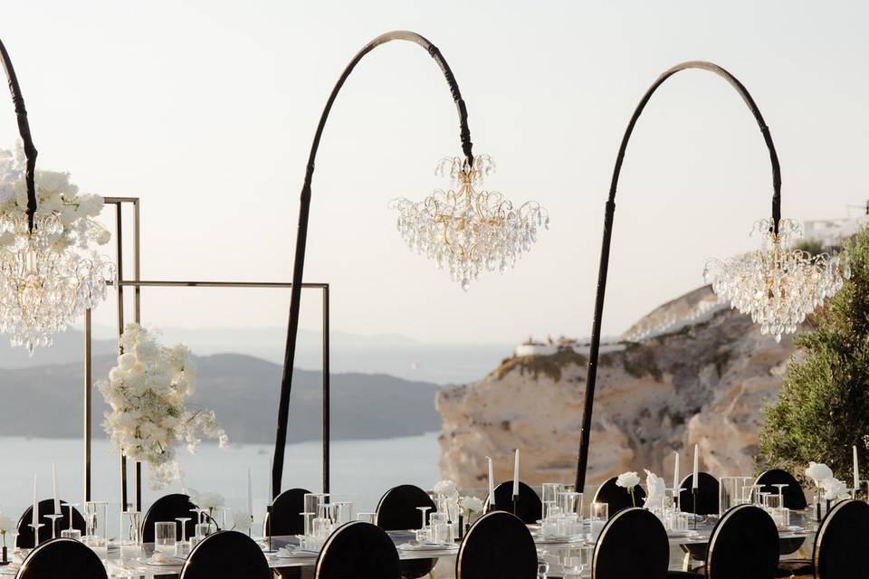 chandelier hanging over wedding table in santorini