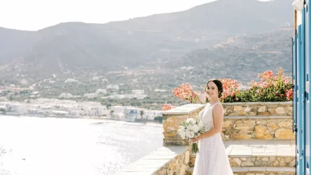 a bride staring at the aegean sea