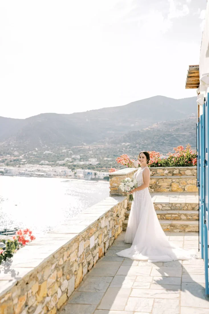 a bride staring at the aegean sea